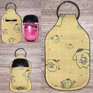 PomPompurin yellow Hello Kitty hand sanitizer holder new